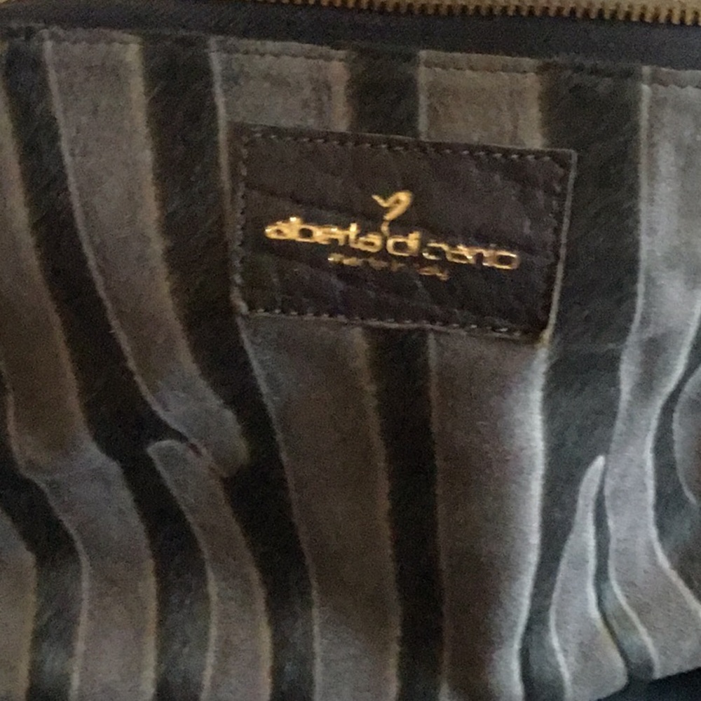 Small leather with fur accents bag